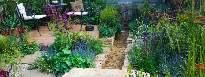 A well-planned patio garden with a water feature